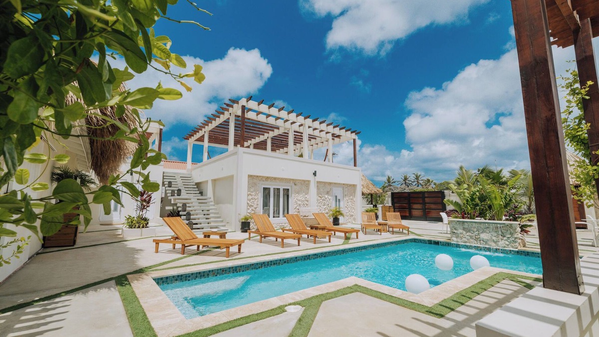 De Bruynewijk Resort | Escape to Eva Resorts in Savaneta, Aruba, a boutique luxury retreat with six unique apartments accommodating up to 14 guests. Just steps from turquoise waters, the resort features a saltwater pool, rooftop terraces with sunset views, and more.