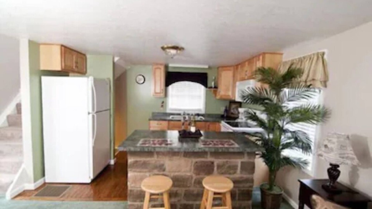 Dundee Cottage | Escape to our romantic stone cottage by a pond overlooking Amish country