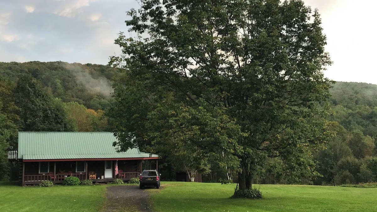 East Worcester Cabin | Escape to the country at our creek-side log cabin.