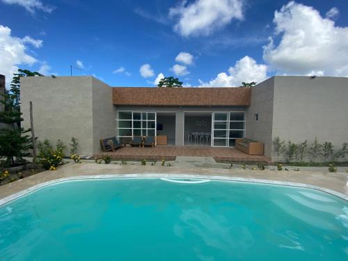 Nova Cruz House | Espaço Quintal Fértil
