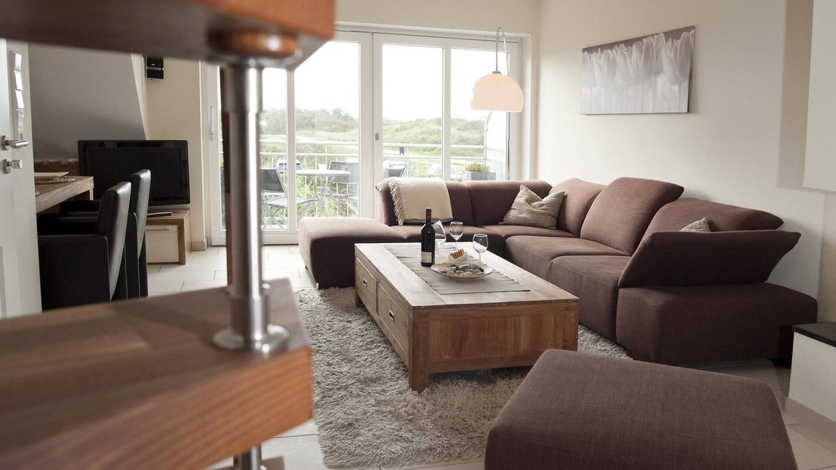 Borkum Apartment | Exclusive 5*FeWo with sea view, roof terrace and gas fireplace.