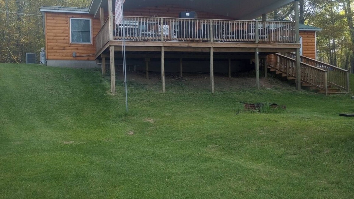 Long Lake House | Exclusive lake front property. Nothing but the ritz. Outdoor kitchen & hot tub.