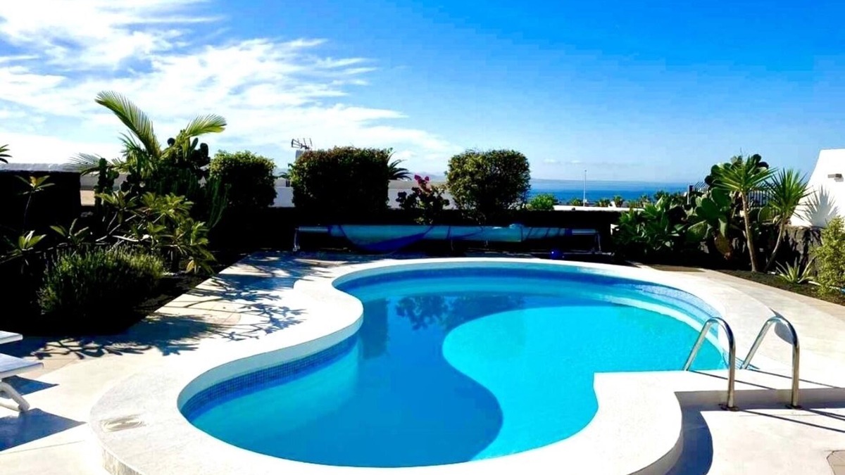 Playa Blanca Villa | Exclusive location, Playa Blanca, heated pool, sea views, near the beach, WiFi