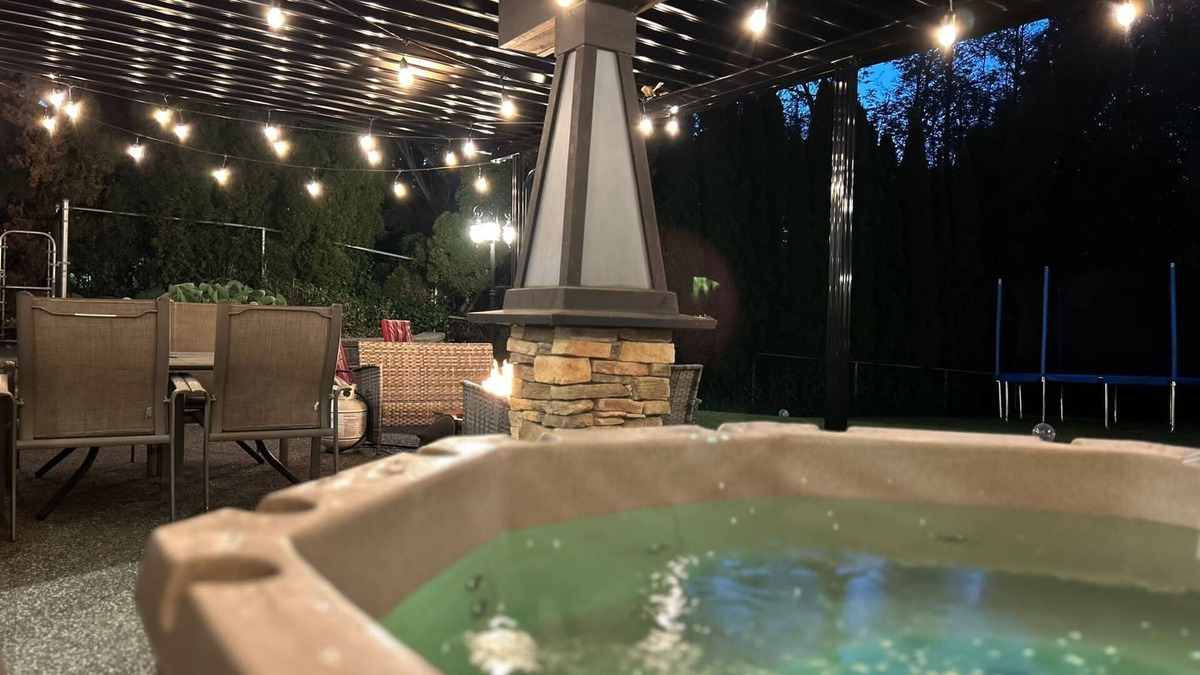 Walnut Grove House | Executive 2 bedroom suite with theater room, hot tub & large outdoor patio.
