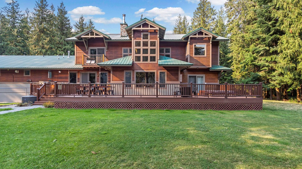 Clark Fork House | Expansive Riverfront Lodge with Dock, Game Room, Bar & Spacious Deck!