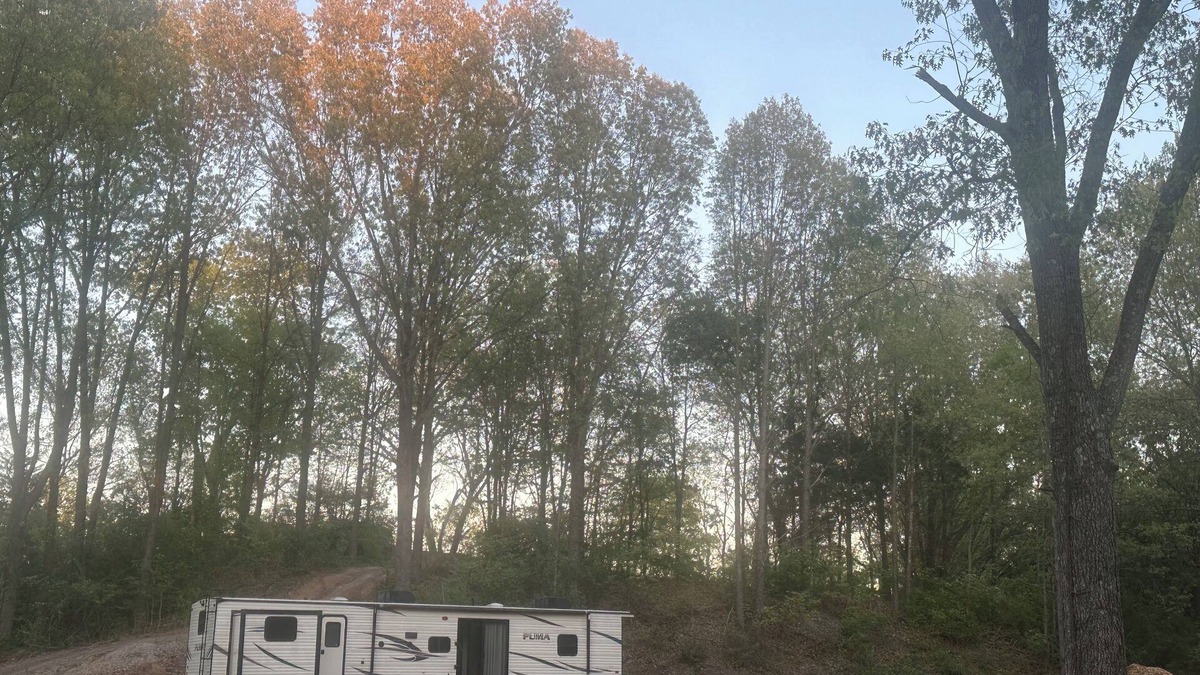 Carterville RV Rental | Experience Glamping in style. Private Lake - Pet Friendly!
