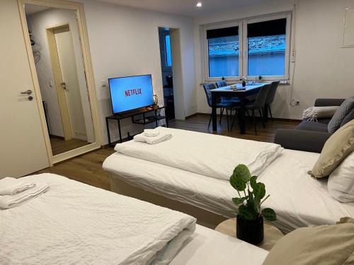 Dortmund Apartment | FÜR 3 - Boxspringbetten, Smart TV, Parkplatz, Stadion Nähe