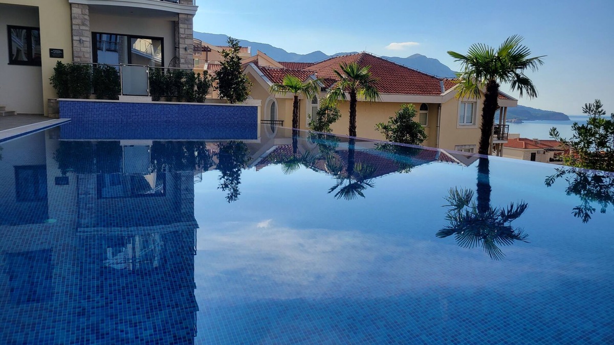 Becici Apartment | Family-friendly 2-Bedroom Sea View Apartment with Huge Terrace, Pools, Spa & Gym