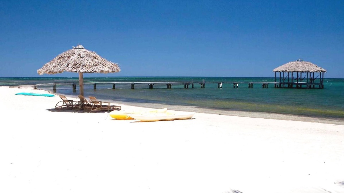 Palmetto Bay House | Family Friendly Beach Bungalow | Private Eco Dive Resort With A Pool & Beach