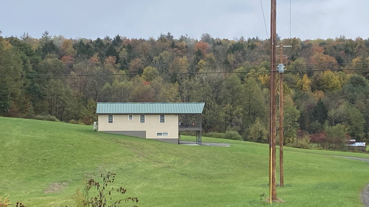 Whitney Point Cottage | Family friendly cottage, covered deck, close to lake to fish, swim, and boat
