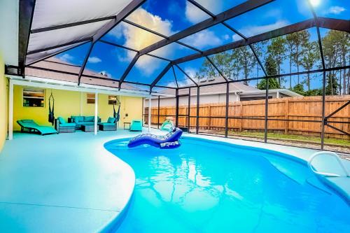 Palm Bay House | Family friendly paradise Pool Home!