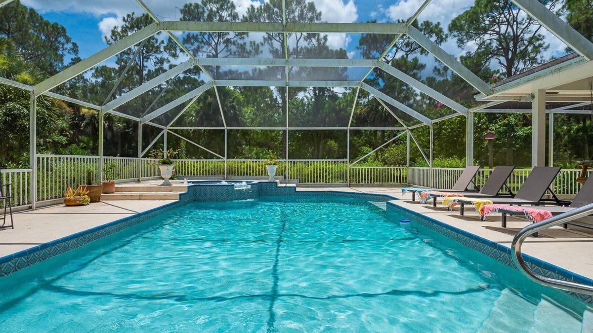 Jupiter Farms House | Family Getaway in Jupiter Farms: Fun Pool & Lake!