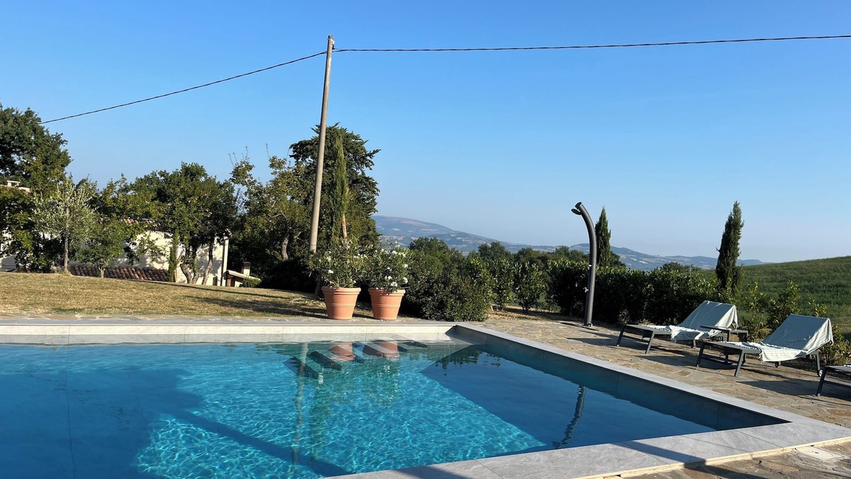 Pergola House | Family holiday home with great view, heated pool and pizza oven
