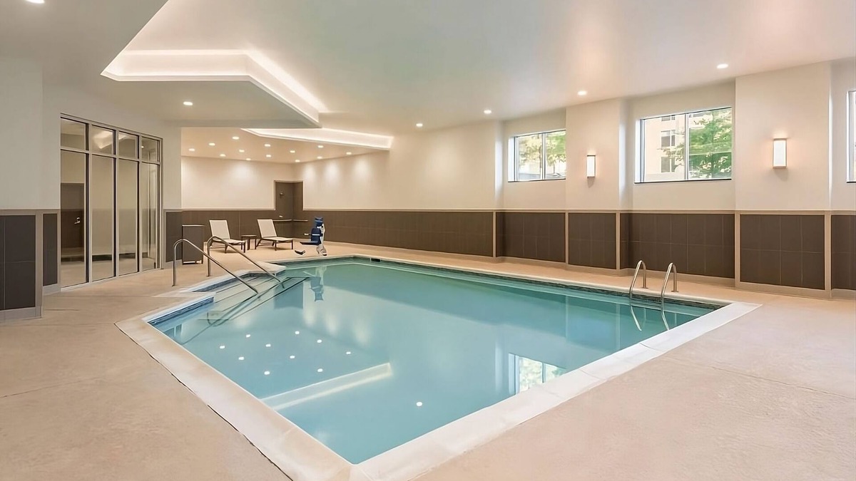 Greenville Downtown Apartment | Family Retreat w/Queen Beds, Indoor Pool Access, Near Peace Center & Museums