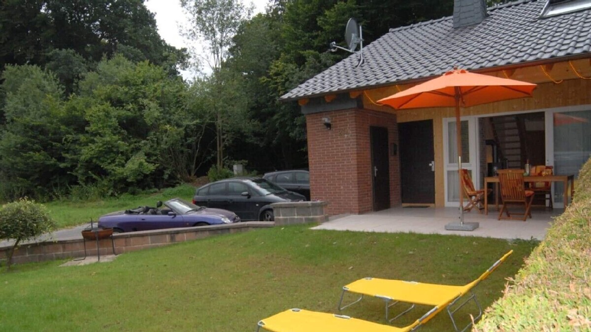 Wrexen House | Fantastic Holiday home with jacuzzi and fireplace at the border of a wood