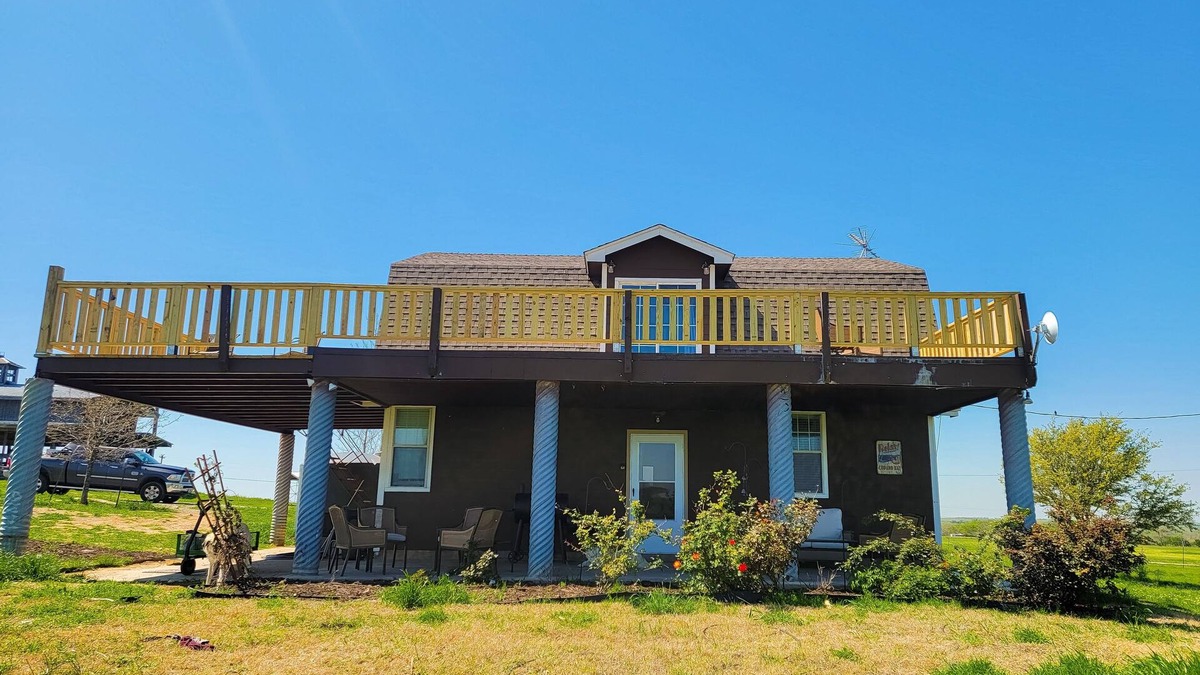 Cleburne Other | Farmhouse-style home with a balcony, gas grill, separate loft, W/D, and AC