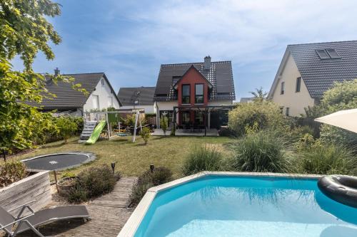 Weimar House | Ferienhaus Thiele - Familienglück mit Garten - Kamin - Sauna - Pool