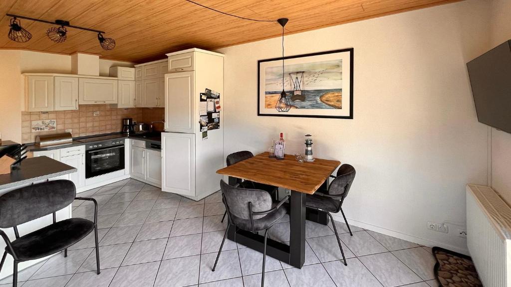 Dorumer Neufeld Apartment | Ferienwohnung am Sonnenstrahl