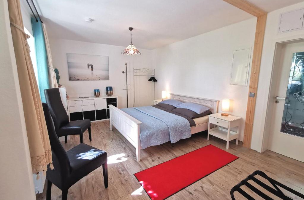 Kamin Apartment | Ferienwohnung "Carinerland" mit Terrasse in Ostseenähe