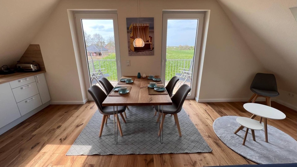 Neßmersiel Apartment | Ferienwohnung Hafenblick