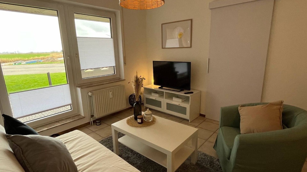 Westeraccumersiel Apartment | Fewosielblick 10 Gehminuten bis zum Wattenmeer