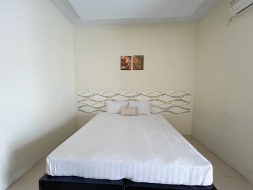 Palu Hotel | Filia Syariah Homestay Palu RedPartner