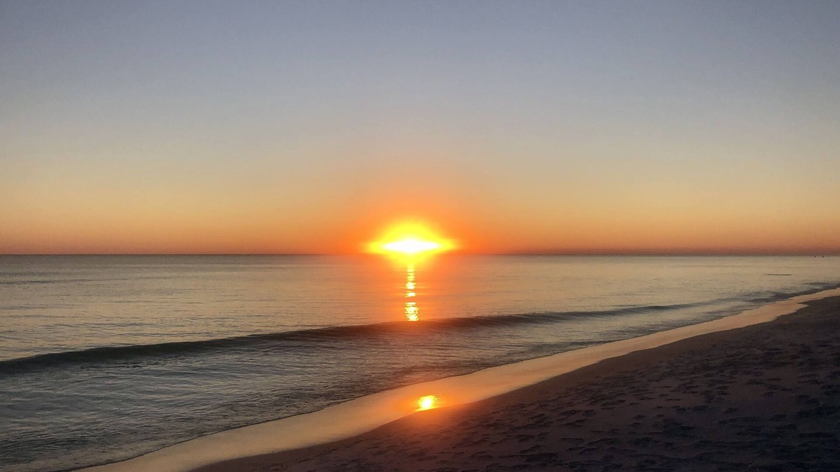 Gulf Place Condo | First floor condo overlooking the heated pool. Steps from the private beach!