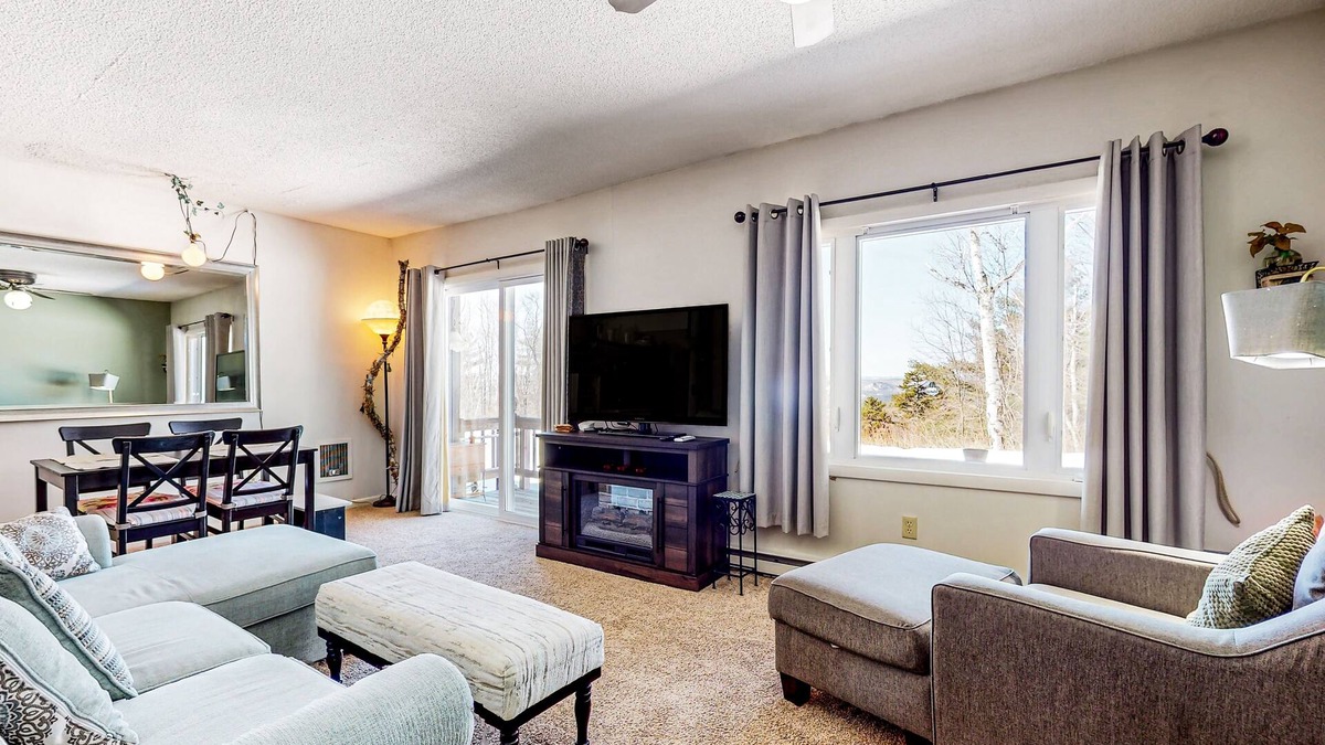 Campton Condo | First-floor mountain condo with amazing views, yard, pool, & gym - near skiing
