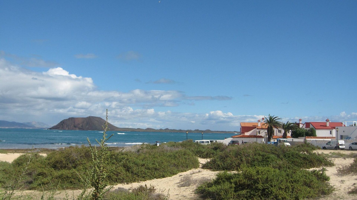 Corralejo Villa | First line of sea and beach, beautiful and quiet Villa with private heated pool.