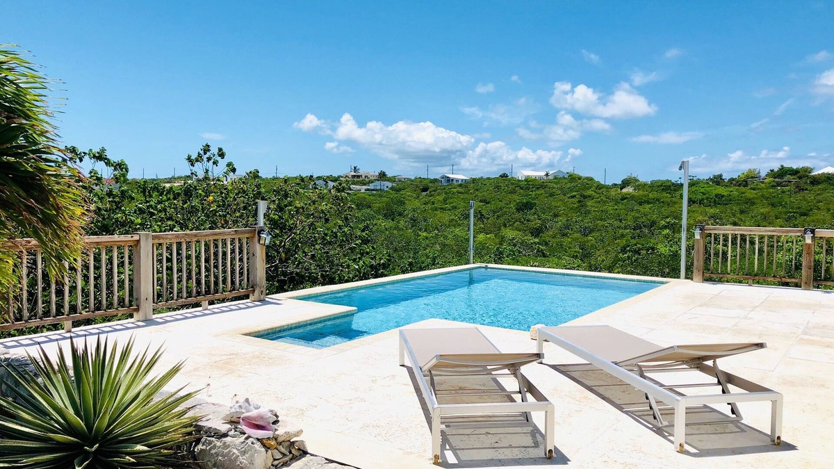 Long Bay Cottage | Flame Tree Cottage. Private home with pool and ocean view. 1/2 mile to beach
