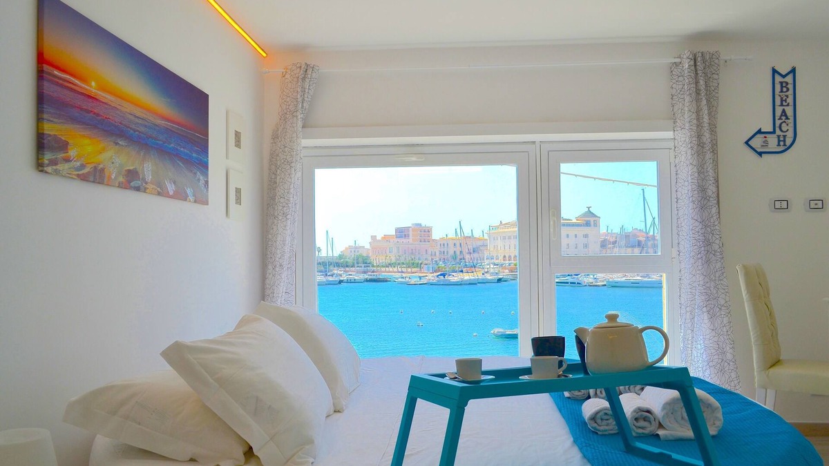 Santa Lucia Apartment | Flamingo Spa loft - Seaside - view on sea and Ortigia - fiber wifi - jacuzzi