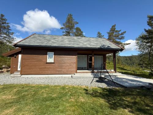 Hardangerfjord House | Flott familiehytte på Haukås i Strandebarm