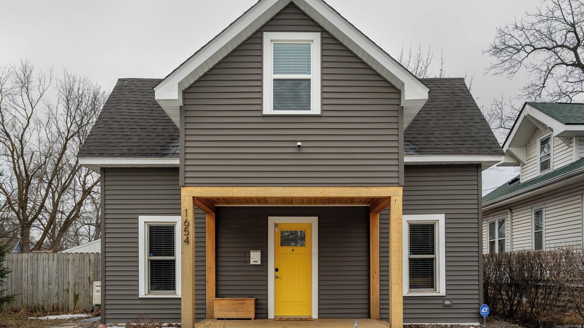 Midway House | Follow the Yellow Front Door to a welcoming home close to everything.