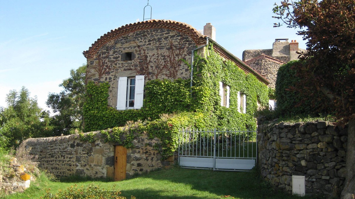 Chalus House | Former priory with garden, located above the village