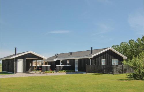 Grønhøj House | Four-Bedroom Holiday Home In Lokken