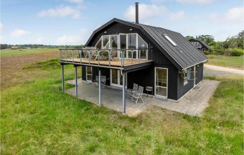 Ringkøbing-Skjern Municipality House | Four-Bedroom Holiday Home In Skjern