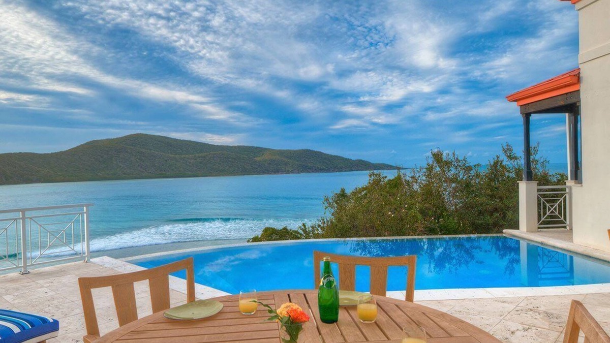Scrub Island Villa | Four-Bedroom Villa: Luxurious bedrooms and private terraces with ocean views.