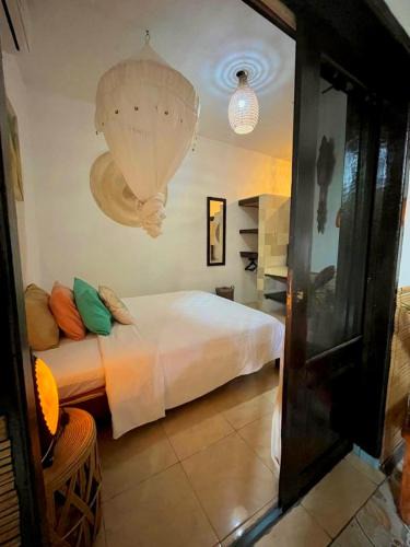 Senggigi House | Frangipani garden villa