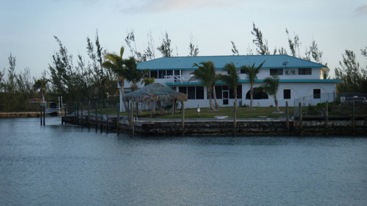 Bell Channel Bay Apartment | Free boat docks, 10 Bedroom, 10 Bath, Canal Front And Short Walk To Taino Beach
