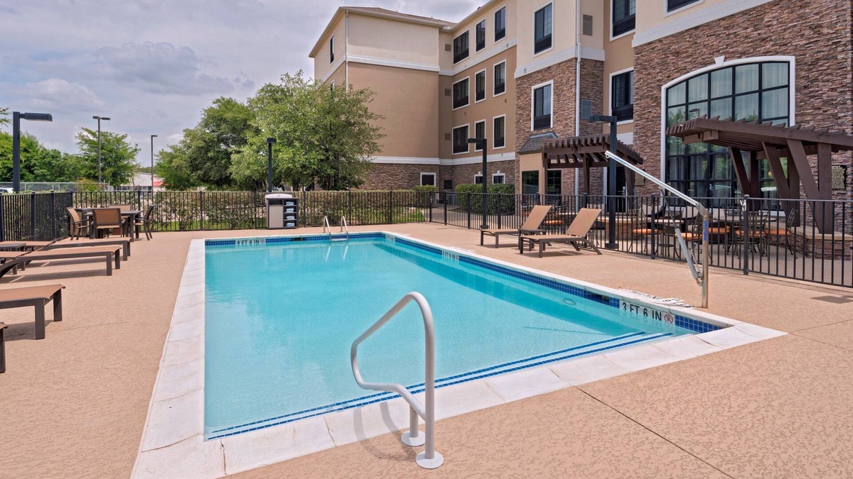 McNeil Apartment | Free Breakfast Buffet Included! Gym, Business Center, Pool Access.