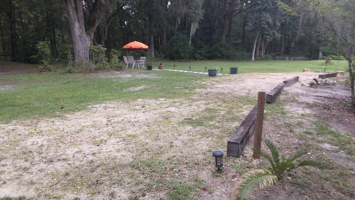 Alachua RV Rental | Full hook up RV Trailer site on private 1 acre Conveniently located