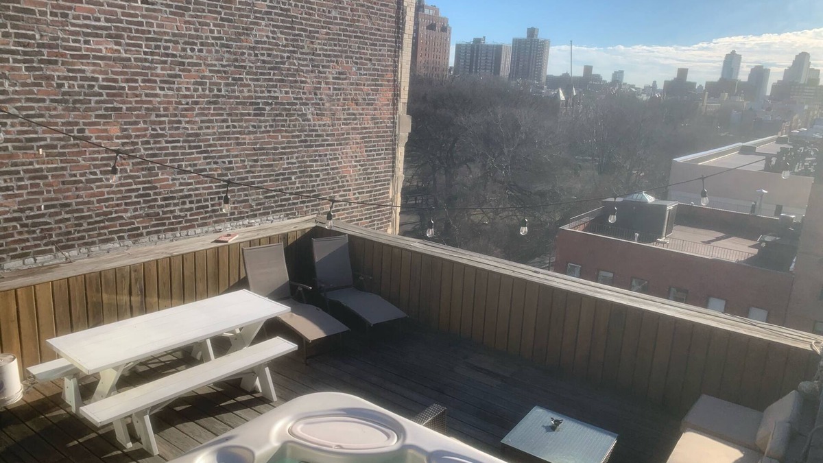 East Village Apartment | Fully stocked oasis with private outdoor space, BBQ, hot tub, surround sound