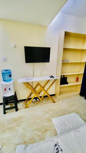 Western Province Apartment | furnished two bedroom apartment with swimming pool, fully equipped gym, private parking space ,children playground and unbeatable scenic city views in kilimani