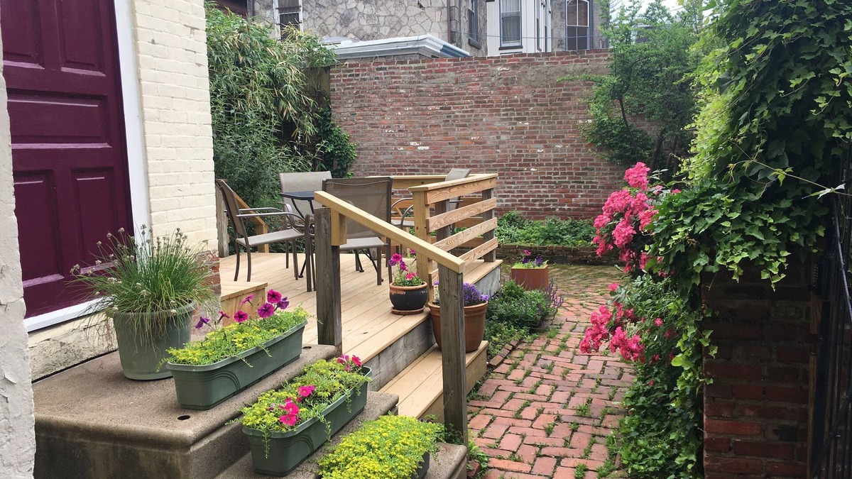 Powelton Village Apartment | Garden Oasis: 1BR Apartment with Patio in Historic Home, Near Universities