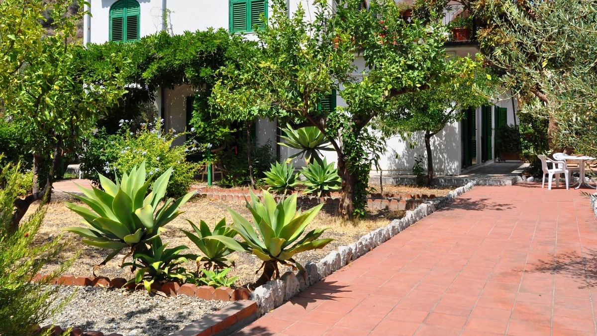 Mazzeo Apartment | Gardenhouse on the largest beaches of Taormina apartment n. 1 for 4 people