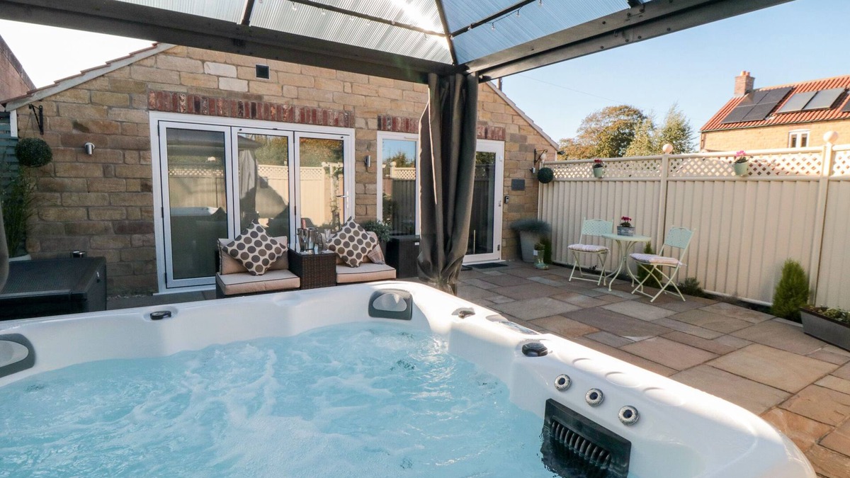 Malton Cottage | GARTHGATE HOLIDAY LODGE, pet friendly, with hot tub in Malton