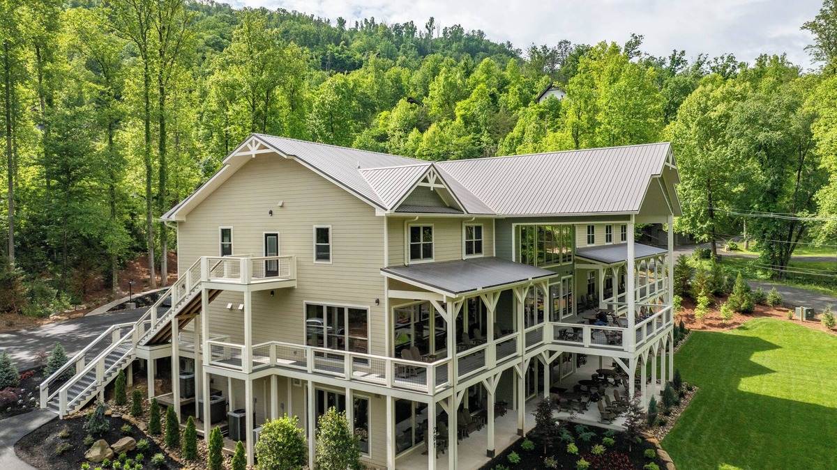 Gatlinburg Cabin | GATLINBURG LUXURY 21 BEDROOM! Elevator, Pool, Private Pavilion, Movie Theater.
