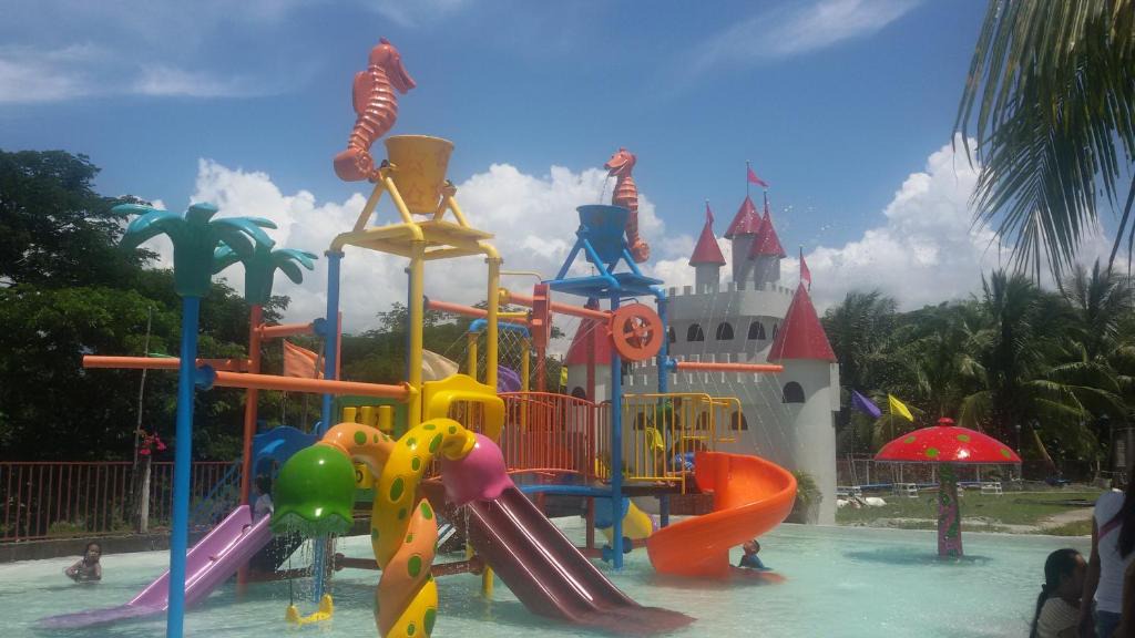 Cabadbaran Resort | Gazebo Pools and Restaurant