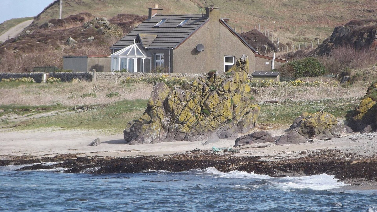 Bellochantuy Cottage | A detached cottage with views across to Gigha and the Paps of Jura.