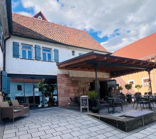 Zirndorf Apartment | Genusspur - Schiefer Salon